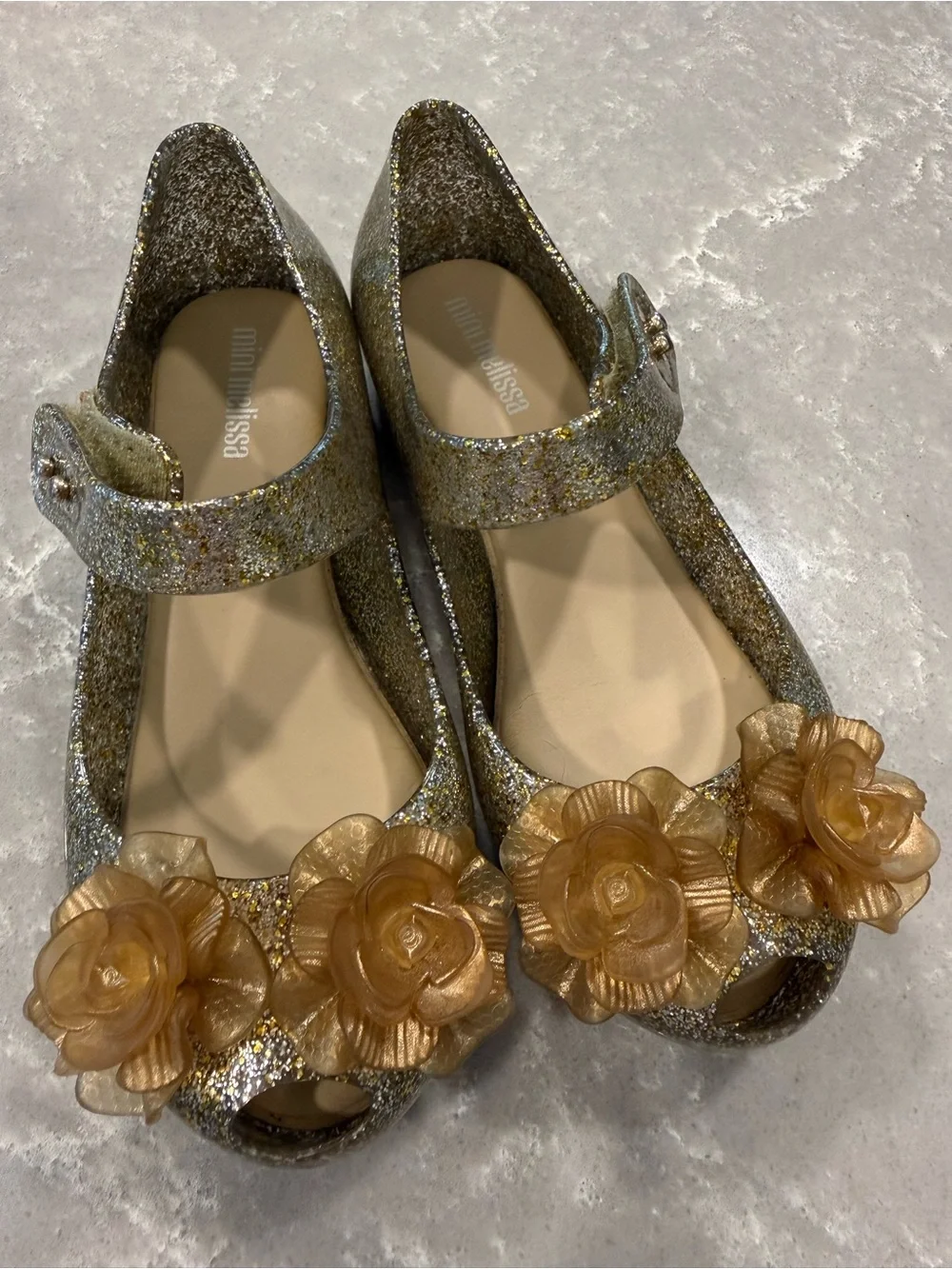 Mini Melissa Girls Gold Glitter Mary Jane Shoes with Champagne Flower Like New